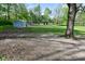 Expansive backyard with a shed and chicken coop, offering ample space for outdoor activities at 296 W Greencastle Rd, Mooresville, IN 46158