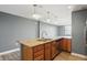 Kitchen island with stainless steel appliances, and granite countertops at 350 N Meridian N St # 701, Indianapolis, IN 46204