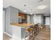Charming kitchen features a peninsula with stools and stainless steel appliances at 350 N Meridian N St # 701, Indianapolis, IN 46204