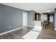 Open concept living and kitchen area with luxury vinyl plank flooring throughout at 350 N Meridian N St # 701, Indianapolis, IN 46204