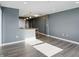 Open concept living and kitchen area with luxury vinyl plank flooring at 350 N Meridian N St # 701, Indianapolis, IN 46204