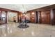 Ornate lobby with polished marble floors, elegant lighting, and rich wood accents, creating a grand entrance at 350 N Meridian N St # 701, Indianapolis, IN 46204
