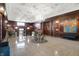 Elegant building lobby features a chandelier, wood paneling, and marble floors at 350 N Meridian N St # 701, Indianapolis, IN 46204