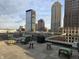 Rooftop deck with seating and an outdoor grill with downtown views at 350 N Meridian N St # 701, Indianapolis, IN 46204