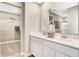 Bright bathroom features double sinks with white quartz counters and a walk-in closet at 3730 Cantebury Dr, Franklin, IN 46131