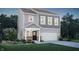Charming two-story home with gray siding, a covered porch, and a well-manicured lawn at 3730 Cantebury Dr, Franklin, IN 46131