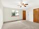Cozy bedroom featuring a ceiling fan and natural lighting from the window at 374 S Baldwin St, Bargersville, IN 46106