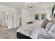 Relaxing main bedroom showing decor with a bed, chair, and open bathroom at 3778 Cantebury Dr, Franklin, IN 46131