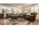 Spacious living room offering plenty of seating, natural light, and access to other living spaces at 411 Woodland W Dr, Greenfield, IN 46140