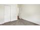 Neutral bedroom featuring carpet and a closet with sliding doors, offering simplicity and functionality at 49 Manchester Dr, Trafalgar, IN 46181