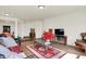 Bright living room with hardwood floors and decorative furnishings offers a welcoming space at 49 Manchester Dr, Trafalgar, IN 46181