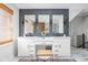 Bathroom featuring a double vanity, black herringbone tile, and modern finishes at 4956 Waterside Cir, Carmel, IN 46033