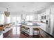Spacious kitchen with white cabinetry, granite countertops, and stainless steel appliances at 4956 Waterside Cir, Carmel, IN 46033