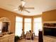 Bright bedroom with lots of natural light from windows, complemented by a ceiling fan and neutral walls at 5190 Pursel Ln, Carmel, IN 46033