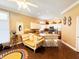 Stylish kitchen with white cabinets, granite countertops, island seating, and adjacent breakfast area at 5190 Pursel Ln, Carmel, IN 46033
