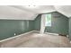 Bedroom with two-tone paint, carpet and bright window at 5840 Brouse Ave, Indianapolis, IN 46220
