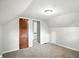 Neutral carpeted bedroom with hallway entrance, and convenient access to other rooms at 5840 Brouse Ave, Indianapolis, IN 46220