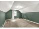 Bedroom with carpet, two-tone paint, and bright window at 5840 Brouse Ave, Indianapolis, IN 46220