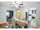 Comfortable dining room offering views into the living and kitchen areas with connecting access at 5840 Brouse Ave, Indianapolis, IN 46220