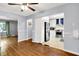 Bright and airy living room showcasing beautiful hardwood flooring at 5840 Brouse Ave, Indianapolis, IN 46220