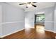 Cozy living room featuring hardwood floors and ample natural light at 5840 Brouse Ave, Indianapolis, IN 46220