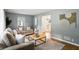 Inviting living room with natural light, comfortable seating, and modern decor at 5840 Brouse Ave, Indianapolis, IN 46220