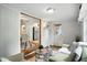 Cozy living area opens to dining space, offering a comfortable and connected living experience at 5840 Brouse Ave, Indianapolis, IN 46220