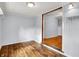 An empty room with hardwood floors and fresh paint at 5840 Brouse Ave, Indianapolis, IN 46220