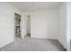 Bedroom with neutral colored carpet, white walls, and an open closet to the side at 6101 Hardwick Dr, Whitestown, IN 46075