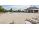 Community pool with lounge chairs and covered area, ideal for relaxation and socializing at 6101 Hardwick Dr, Whitestown, IN 46075