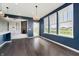 Open dining room flows to kitchen and living areas, providing seamless entertainment space at 6101 Hardwick Dr, Whitestown, IN 46075