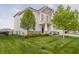Two story home with tidy landscaping and a well-maintained lawn at 6101 Hardwick Dr, Whitestown, IN 46075