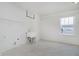 Bright laundry room with utility sink, washer/dryer hookups, and wire shelving above at 6101 Hardwick Dr, Whitestown, IN 46075