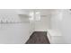 Mudroom with white shelving, hooks, and cabinets for efficient organization at 6101 Hardwick Dr, Whitestown, IN 46075