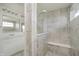 The bathroom features a stand up shower with rain shower head and a built in bench at 6101 Hardwick Dr, Whitestown, IN 46075