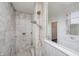 The bathroom has a stand up shower with a standard shower head and a handheld shower head at 6101 Hardwick Dr, Whitestown, IN 46075