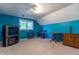 Bright blue bedroom with a ceiling fan and a window, perfect for relaxing and unwinding at 6334 Teak Ct, Indianapolis, IN 46217