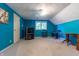 Bright blue bedroom with a ceiling fan and a window, perfect for relaxing and unwinding at 6334 Teak Ct, Indianapolis, IN 46217