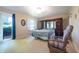 Bedroom with dark wood furniture and a sliding glass door at 6334 Teak Ct, Indianapolis, IN 46217
