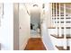 Entryway featuring hardwood flooring and classic architectural details, leading to the living spaces at 6334 Teak Ct, Indianapolis, IN 46217