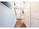 Inviting entryway features hardwood floors, white doors, and staircase leading to the upper level at 6334 Teak Ct, Indianapolis, IN 46217