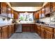 Charming kitchen features natural light and neutral countertops at 6334 Teak Ct, Indianapolis, IN 46217