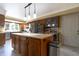 Bright kitchen featuring a center island, stainless steel appliances, and ample cabinet space at 6334 Teak Ct, Indianapolis, IN 46217