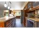 Open kitchen with stainless steel appliances, marble floors and lots of storage at 6334 Teak Ct, Indianapolis, IN 46217