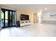 Open living room with access to the porch and great natural light at 6334 Teak Ct, Indianapolis, IN 46217