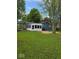 Expansive backyard with attached sun room at 706 Alexander St, Greenwood, IN 46143