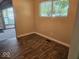 Cozy dining area with stylish flooring, a window for natural light, perfect for intimate meals at 706 Alexander St, Greenwood, IN 46143