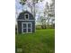 Exterior view of a blue shed in the backyard at 706 Alexander St, Greenwood, IN 46143