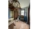 Bathroom in disrepair with damaged ceiling, old fixtures, and missing floor tiles at 715 S Anderson St, Elwood, IN 46036