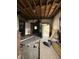 Living room showcases entrances to other rooms, including a sunroom, and offers renovation potential at 715 S Anderson St, Elwood, IN 46036